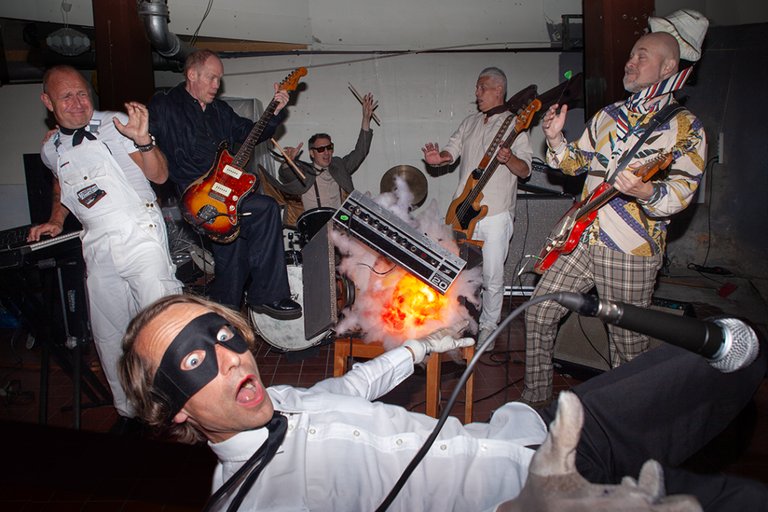 The Bob Hund band members, seemingly caught in a spontaneous explosion