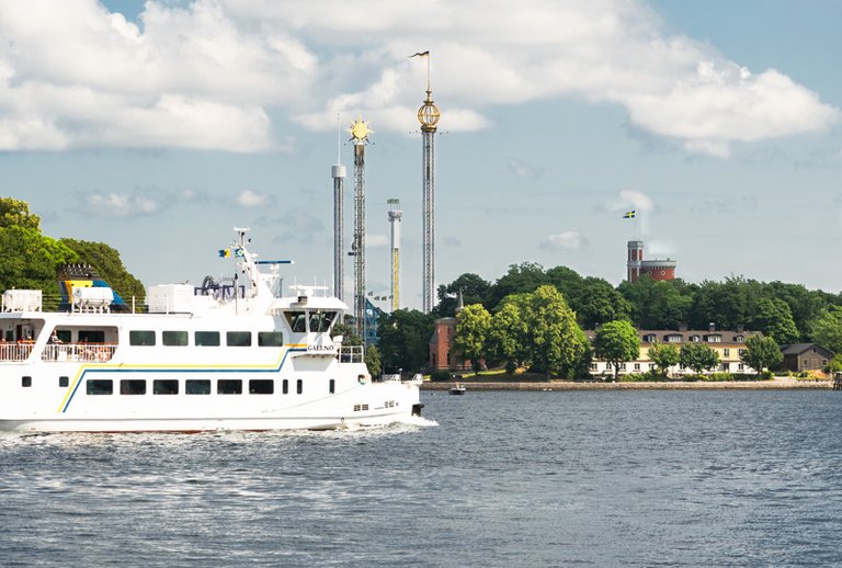 Ferry going to the archipelago. Gröna Lund and Skeppsholmen in the background.