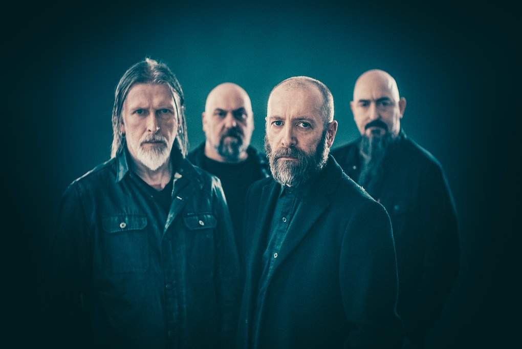 The four members of Paradise Lost, wearing black jackets.