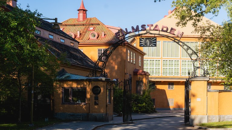 The main gate at Filmstaden Råsunda. Visible in the background is the former soundstage and an office building.